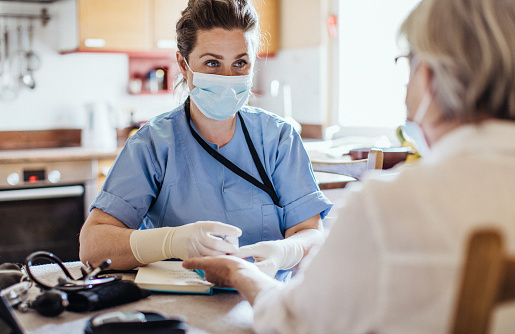 Healthcare worker at home visit